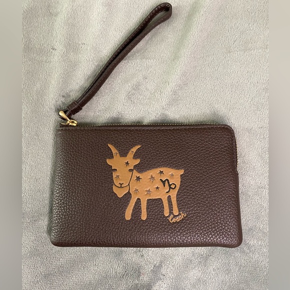 Coach Handbags - Capricorn coach wristlet